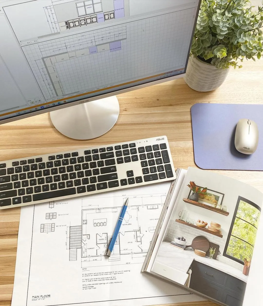 Home addition plans reviewed during a CJM Builders consultation