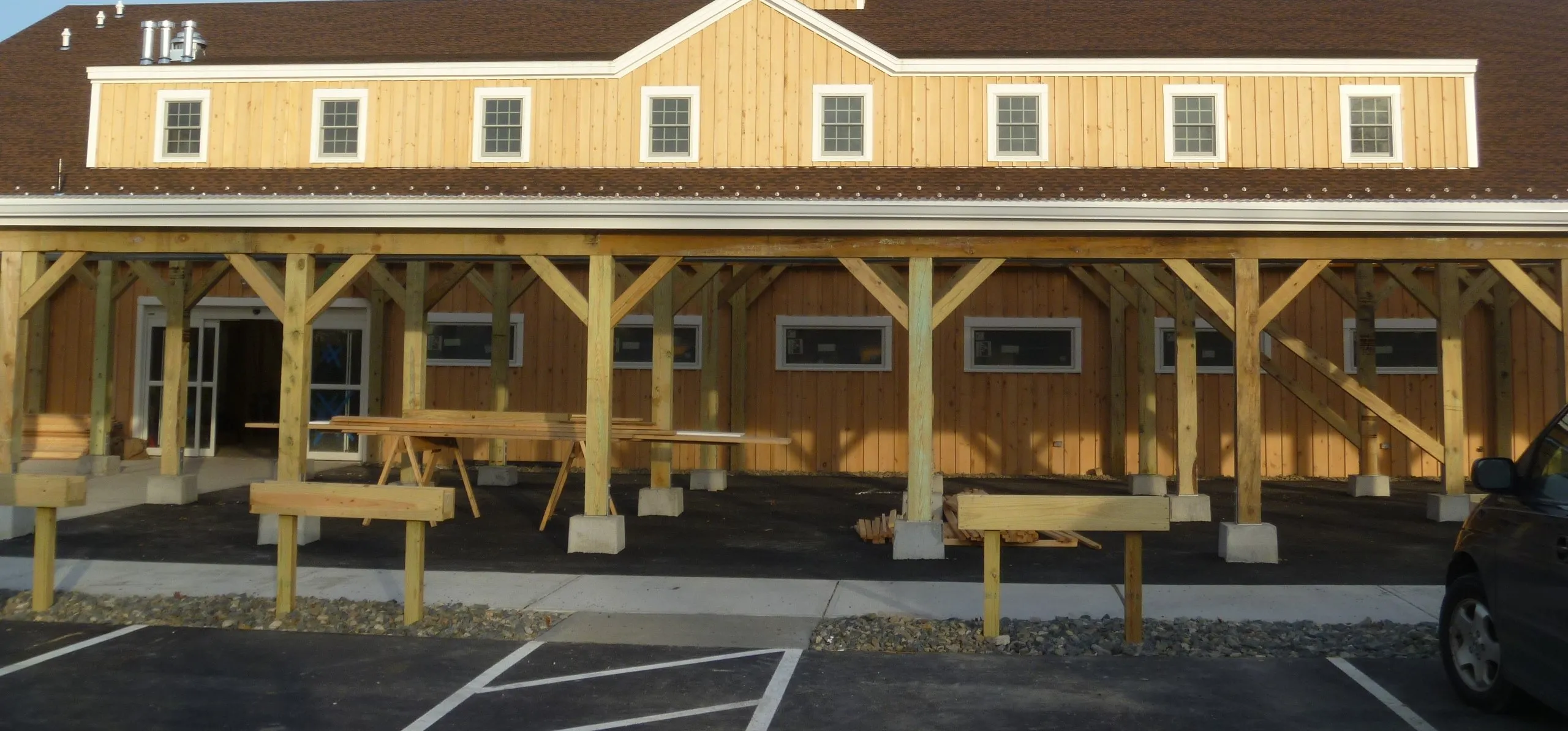 Timber-frame commercial building and parking area, new commercial construction